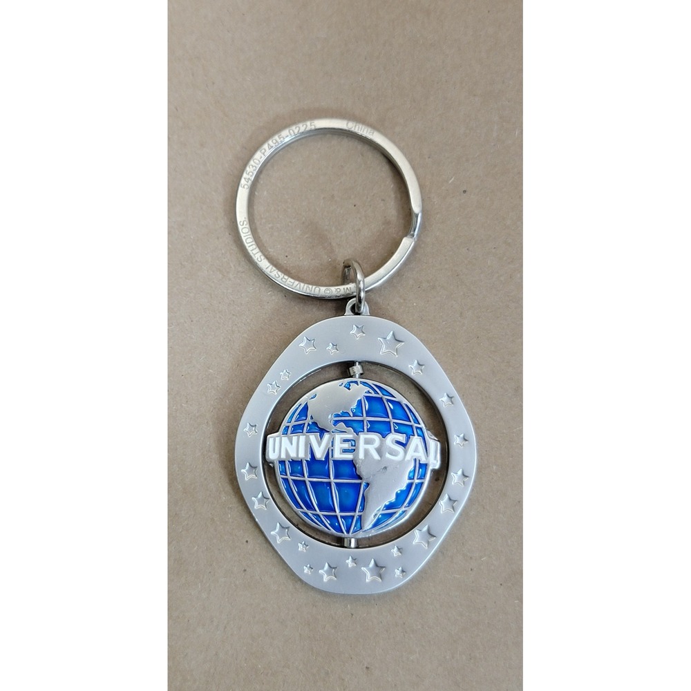 Universal Studios NAME: CHRIS Spinning Globe Keychain Silver Blue Star Frame